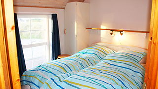 Schlafzimmer in Søndergaards Poolhus
