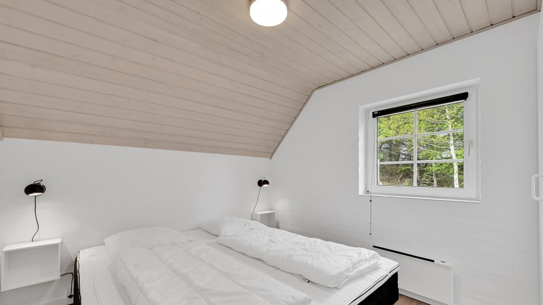 Schlafzimmer in Øhuse Poolhus