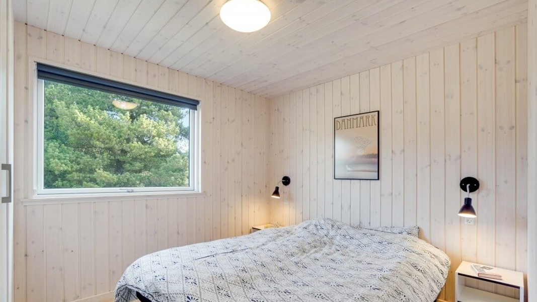 Schlafzimmer in Tane Poolhus