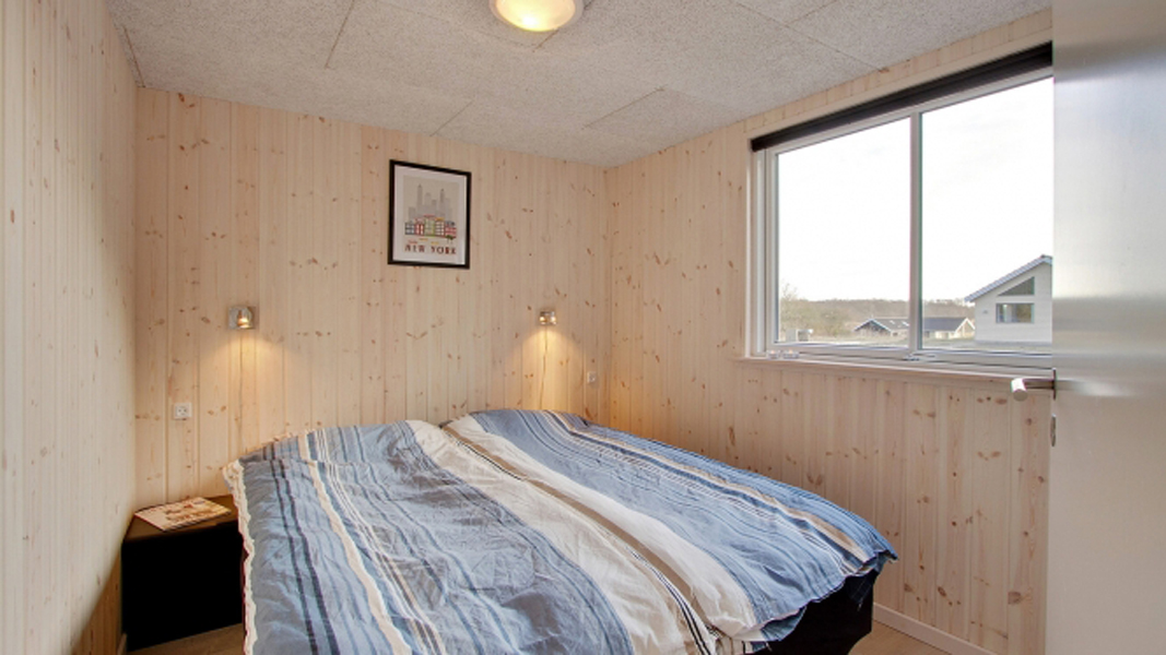 Schlafzimmer in Skovsøen Poolhus