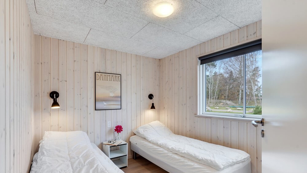Schlafzimmer in Lupin Poolhus