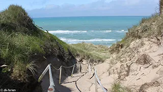 Strand in der Nähe von Narhval Poolhus