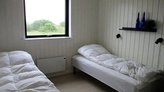 Schlafzimmer in Kringelbæk Hyggehus