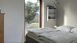 Schlafzimmer in Lyseblå feriestedet