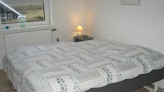 Schlafzimmer in Feriehus strandlivet