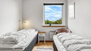 Schlafzimmer in Feriehus Lild Strand