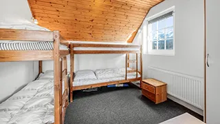 Schlafzimmer in Hermod Poolhus