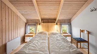 Schlafzimmer in Poolhus Traditionell