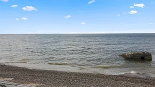 Strand in der Nähe von Poolhus Traditionell