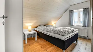 Schlafzimmer in Lild Havblik Poolhus