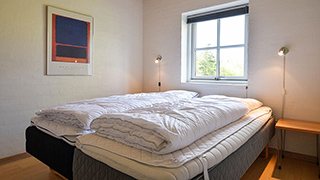 Schlafzimmer in Husby Poolhaus