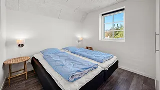 Schlafzimmer in Stråtag poolhus