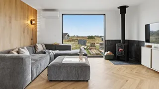 Wohnzimmer von Sommerhus midt i klitterne