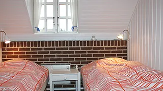 Schlafzimmer in Reetdach Hygge Haus