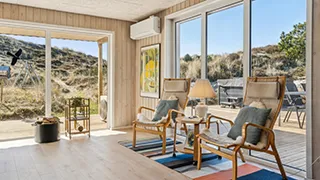 Wohnzimmer von Poolhus i klitterne
