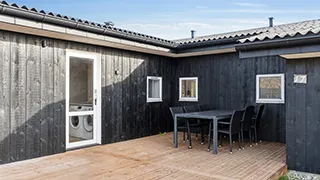 Terrasse von Poolhus i klitterne
