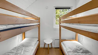 Schlafzimmer in Krattet Poolhus