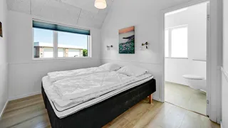 Schlafzimmer in Houvig Poolhus