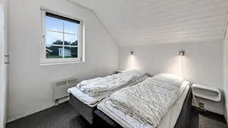 Schlafzimmer in Brunbjerg Poolhus