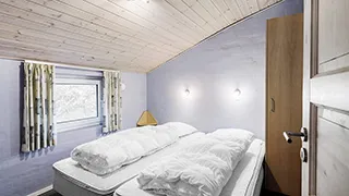 Schlafzimmer in Poolhus Søndervig