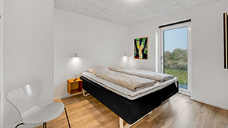 Schlafzimmer in Lodbjerg Hyggehus