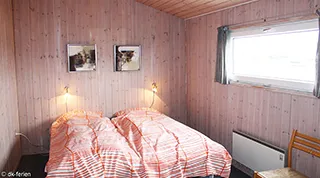 Schlafzimmer in Hus Baunebjerg