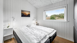 Schlafzimmer in Saunahus Søndervig