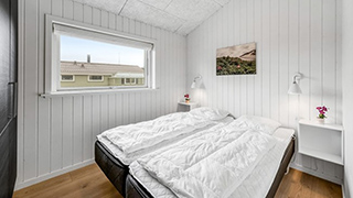 Schlafzimmer in Saunahus Søndervig