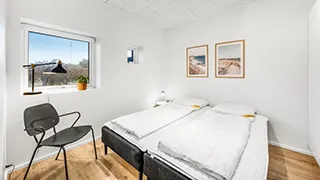 Schlafzimmer in Lejlighed Søndervig