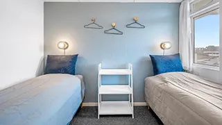 Schlafzimmer in Lejlighed ved klitterne