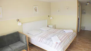 Schlafzimmer in Hjelme Appartement