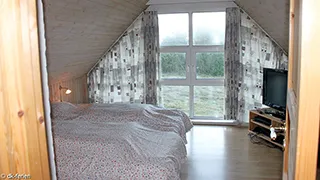 Schlafzimmer in Per Knolds Poolhus