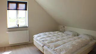 Schlafzimmer in Hus Neder