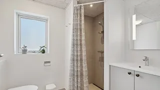 Badezimmer in Småfolks Poolhus