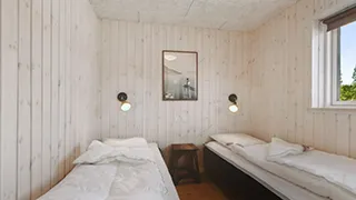 Schlafzimmer in Poolhus Lakolk