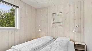Schlafzimmer in Råbjerg Poolhus
