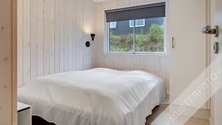 Schlafzimmer in Drømmeferie Poolhus