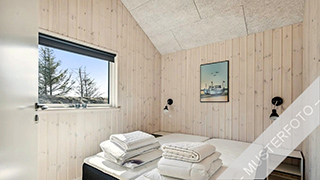 Schlafzimmer in Svennesmølle Poolhus