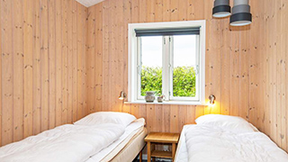 Schlafzimmer in Flovt Strand Hyggehus