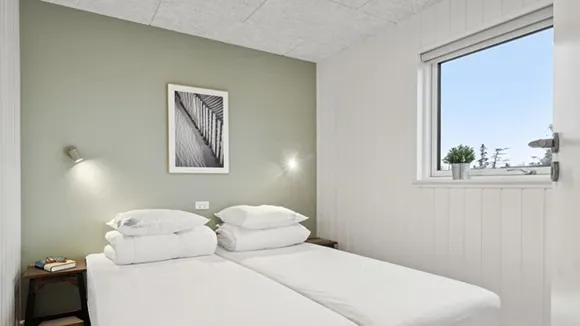 Schlafzimmer in Poolhus Strandkrogen