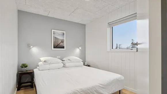 Schlafzimmer in Poolhus Strandkrogen