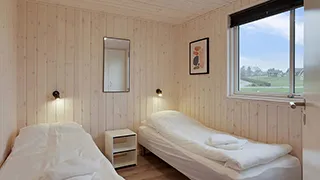 Schlafzimmer in Averna Poolhus