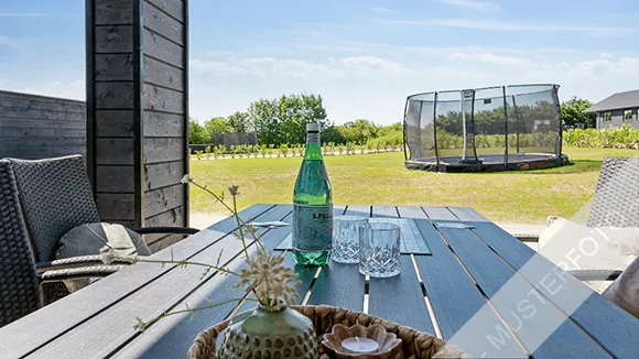 Terrasse von Kurve Poolhus
