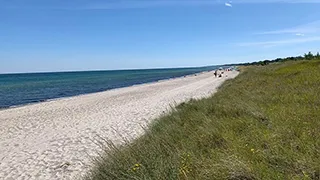 Strand in der Nähe von Lupin Poolhus