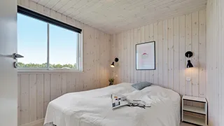 Schlafzimmer in Ukama Poolhus