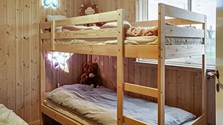 Schlafzimmer in Sortspætte Aktivhus
