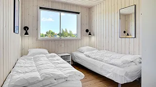 Schlafzimmer in Holmemose Poolhus