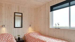 Schlafzimmer in Bientjevej Aktivhus
