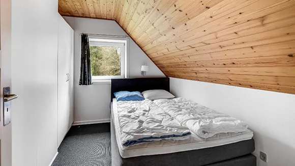 Schlafzimmer in Poolhus Brande