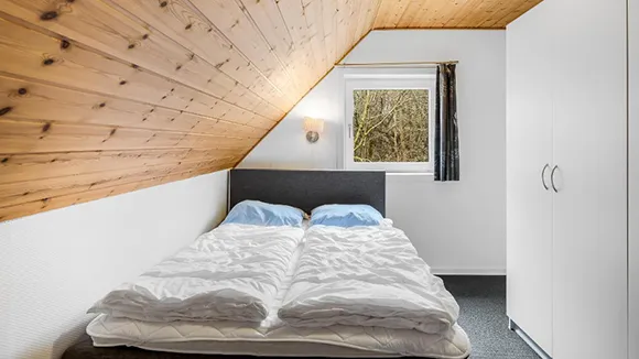 Schlafzimmer in Poolhus Brande